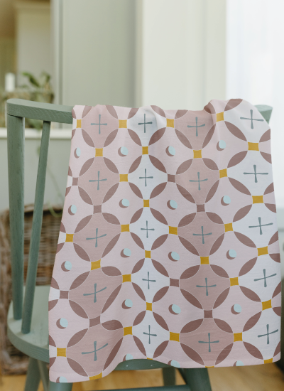 Overlapping circle pattern design on a tea towl designed by la ruha